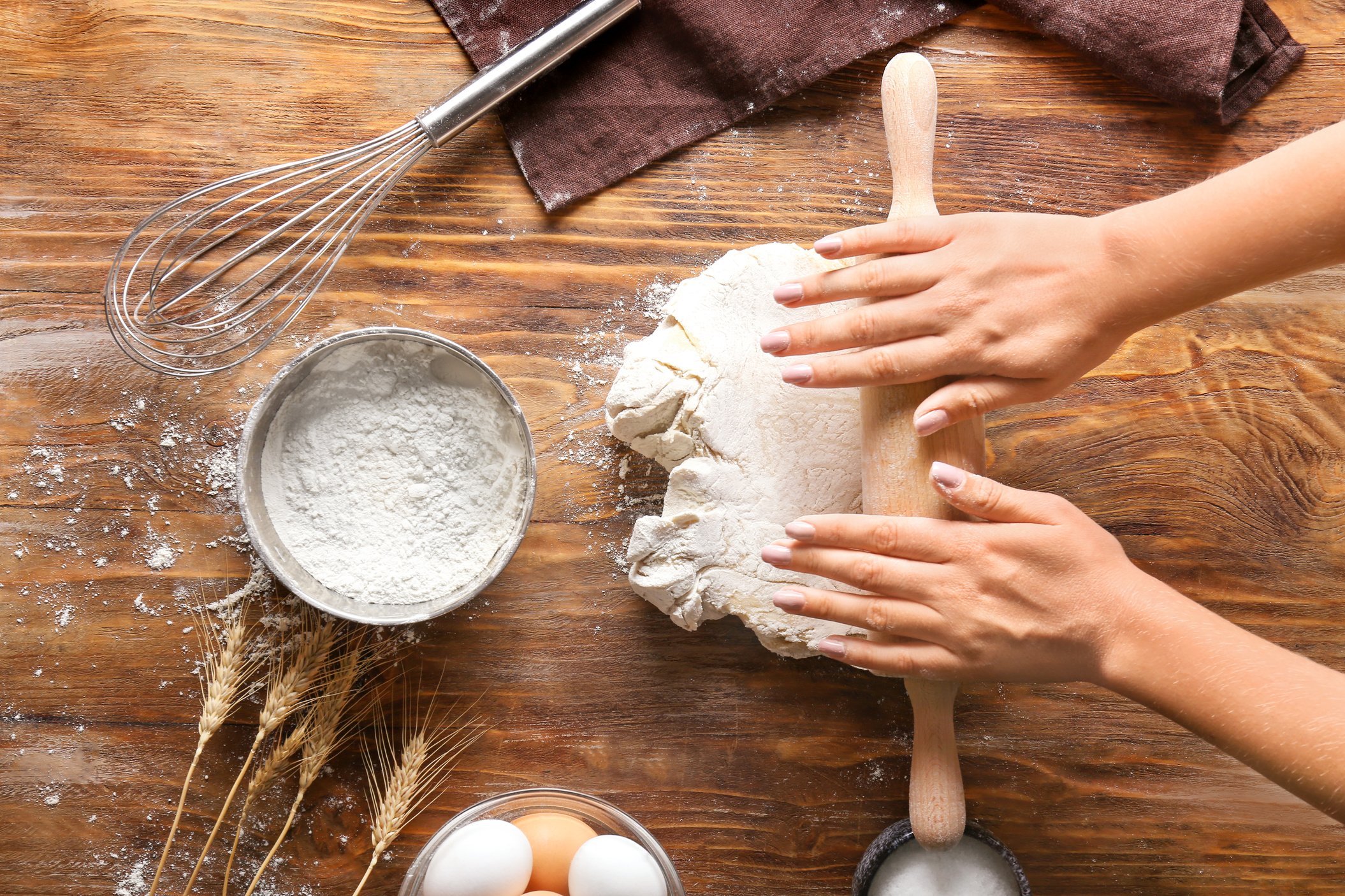 Woman Rolling Out Dough